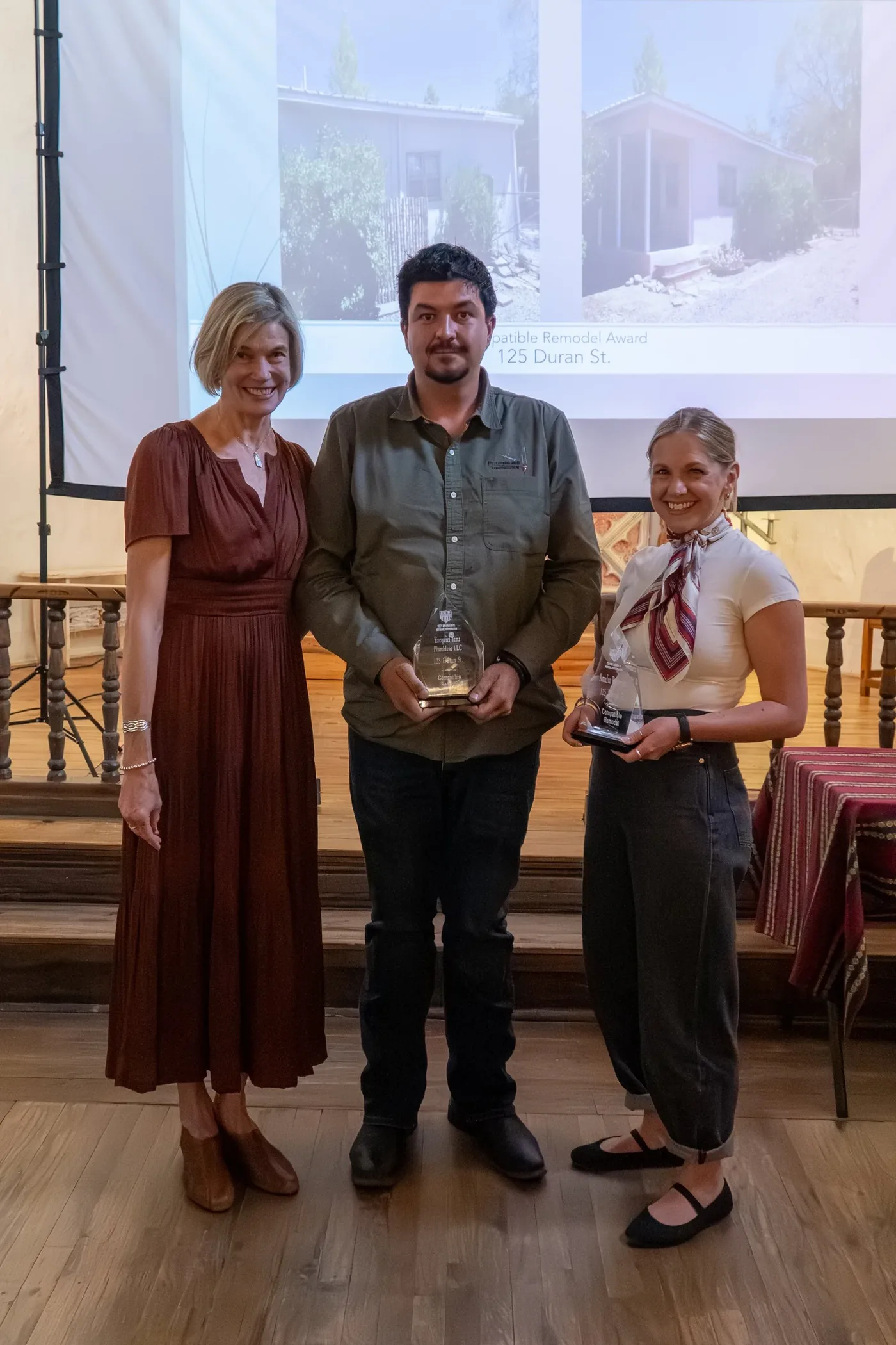 Ezequiel Tena of Plumbline LLC receiving the 2026 Compatible Remodel Award at the Santa Fe Heritage Preservation Awards