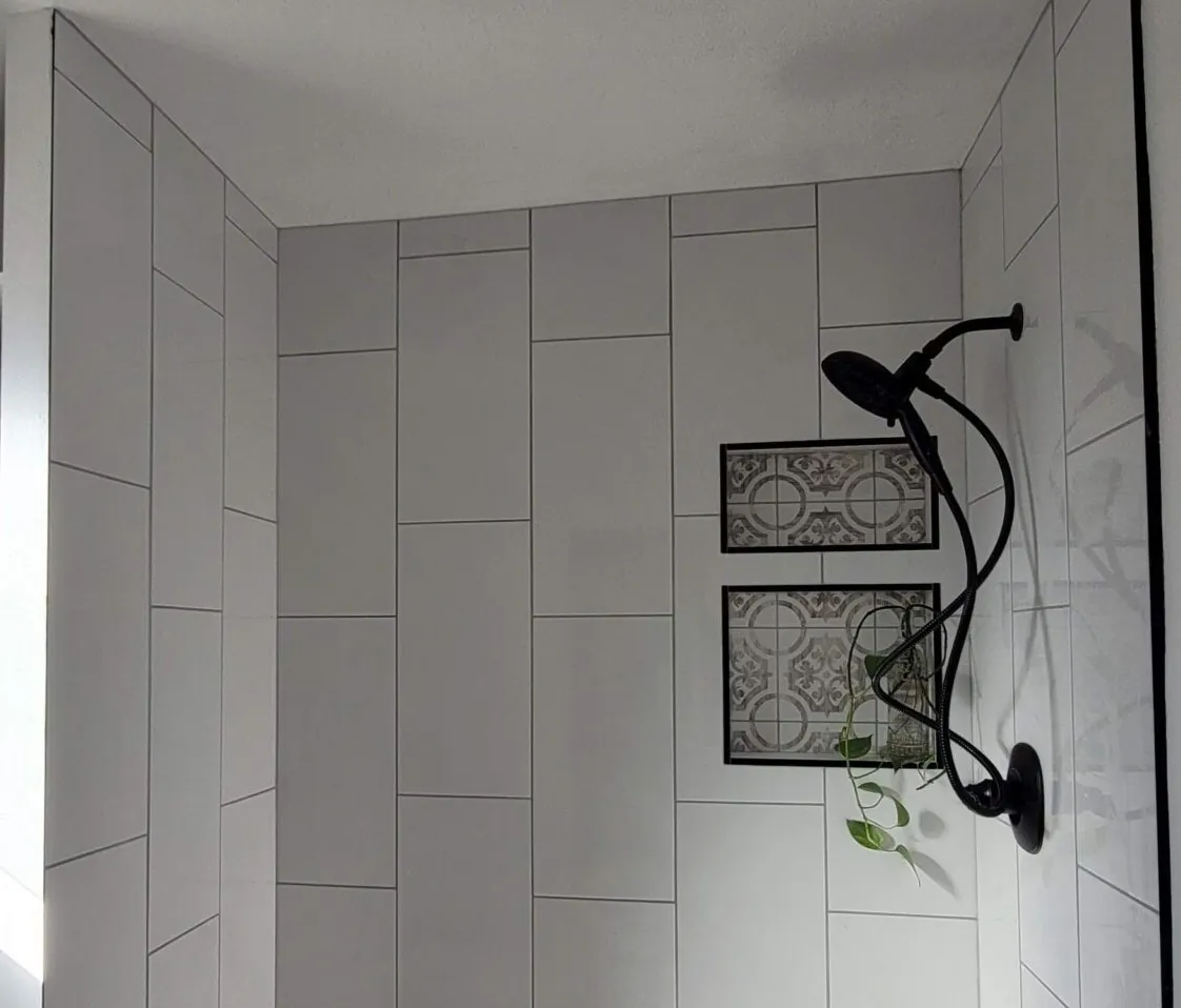 Bathroom remodel with tub-to-shower conversion and new tile in Albuquerque